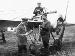 Fokker E.III 105/15 with Ernst Udet inspecting ammunition (012140-114)